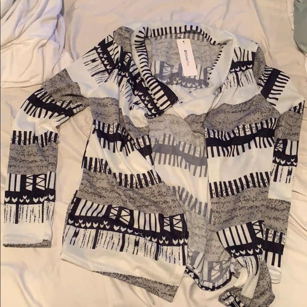 Black wire and grey cardigan